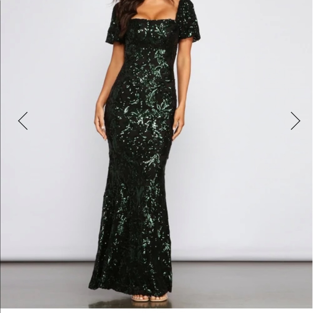 Emerald green formal dress. I bought it as a back up for my daughters wedding.